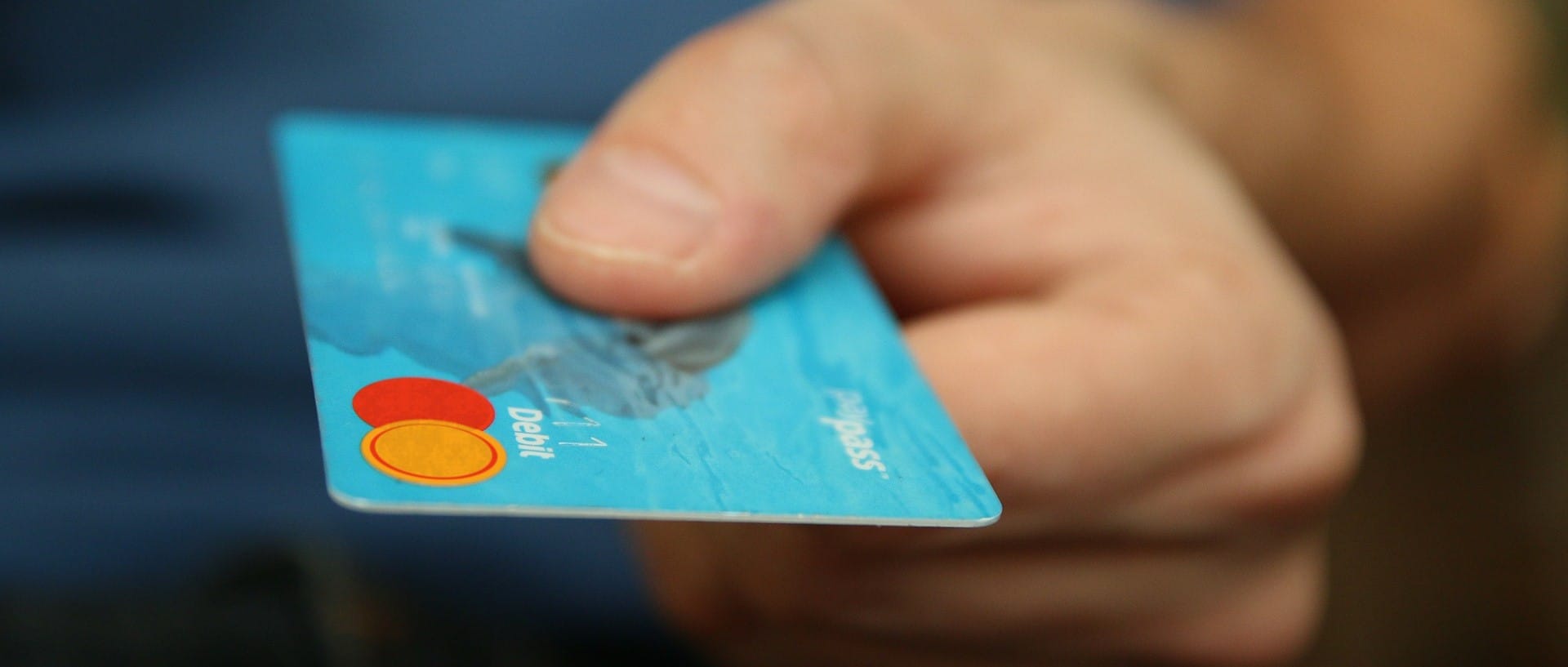 person-holding-creditcard